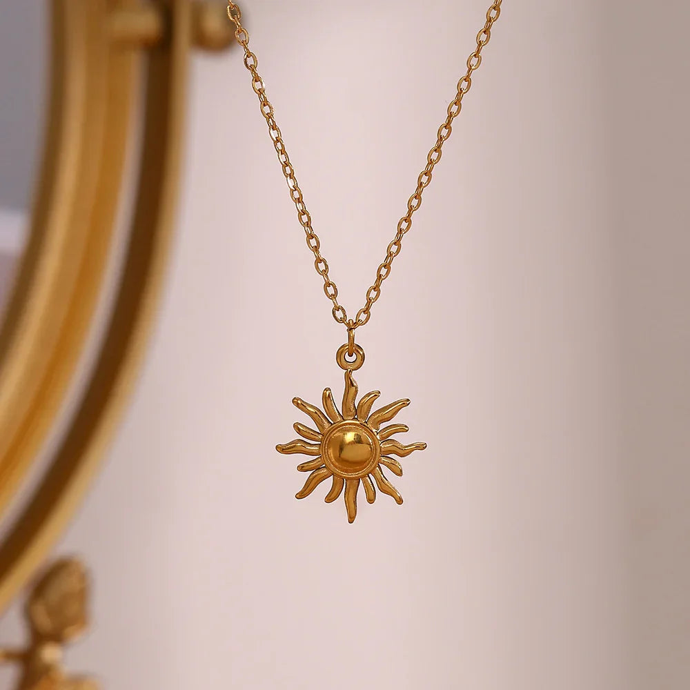 Sybil - Gold Sun Necklace — bringing modern charm to your space. Sybil - Gold Sun Necklace — bringing modern charm to your space.