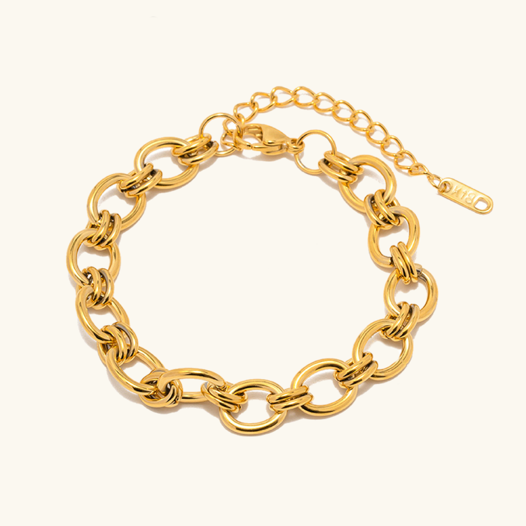 Betty - Loop Gold Bracelet — bringing modern charm to your space. Betty - Loop Gold Bracelet — bringing modern charm to your space.