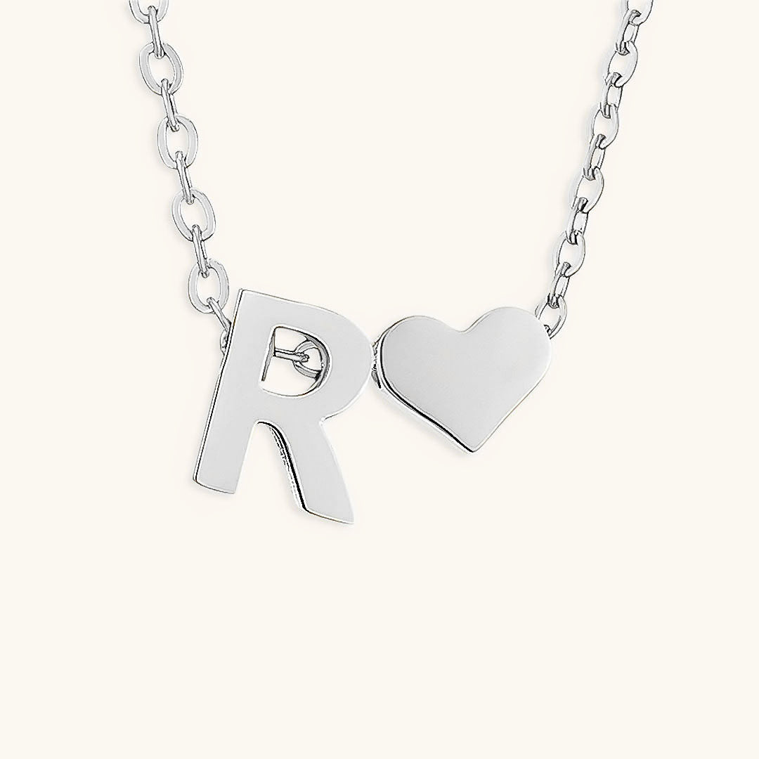 Mallory - Love Initial Letter Necklace — bringing modern charm to your space. Mallory - Love Initial Letter Necklace — bringing modern charm to your space.