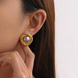 Andrea - Round Twist Earrings — crafted for everyday quality. Andrea - Round Twist Earrings — crafted for everyday quality.