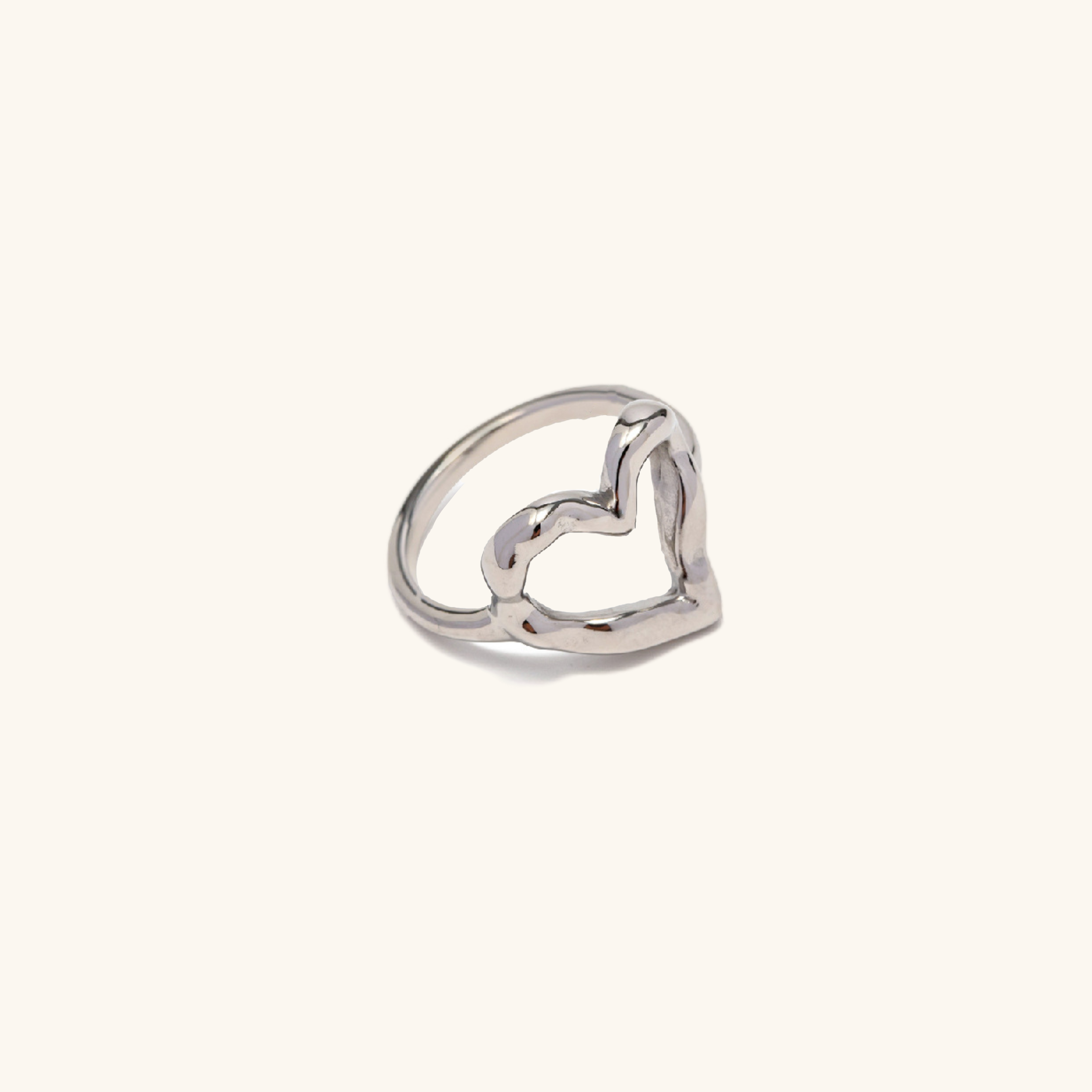 Nalini - Hollow Heart Ring — bringing modern charm to your space. Nalini - Hollow Heart Ring — bringing modern charm to your space.