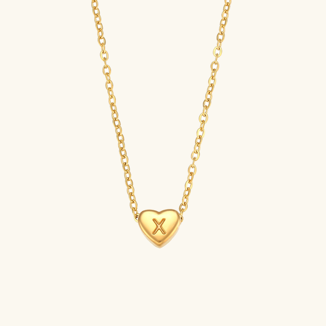 Juliette - Heart Initial Gold Necklace — crafted for everyday quality. Juliette - Heart Initial Gold Necklace — crafted for everyday quality.