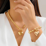 Calira - Beaded Heart Pendant Bracelet and Necklace Set Gold — perfect for those who value comfort and design. Calira - Beaded Heart Pendant Bracelet and Necklace Set Gold — perfect for those who value comfort and design.
