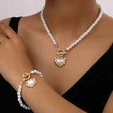 Calira - Beaded Heart Pendant Bracelet and Necklace Set Gold White — crafted for everyday quality. Calira - Beaded Heart Pendant Bracelet and Necklace Set Gold White — crafted for everyday quality.