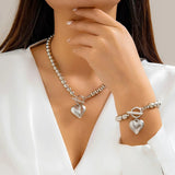 Calira - Beaded Heart Pendant Bracelet and Necklace Set Silver — crafted for everyday quality. Calira - Beaded Heart Pendant Bracelet and Necklace Set Silver — crafted for everyday quality.