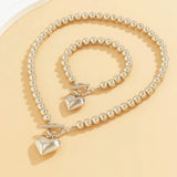 Calira - Beaded Heart Pendant Bracelet and Necklace Set Silver — crafted for everyday quality. Calira - Beaded Heart Pendant Bracelet and Necklace Set Silver — crafted for everyday quality.