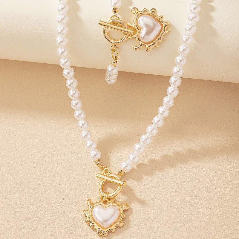 Calira - Beaded Heart Pendant Bracelet and Necklace Set Gold White — crafted for everyday quality. Calira - Beaded Heart Pendant Bracelet and Necklace Set Gold White — crafted for everyday quality.