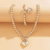 Calira - Beaded Heart Pendant Bracelet and Necklace Set Silver — crafted for everyday quality. Calira - Beaded Heart Pendant Bracelet and Necklace Set Silver — crafted for everyday quality.