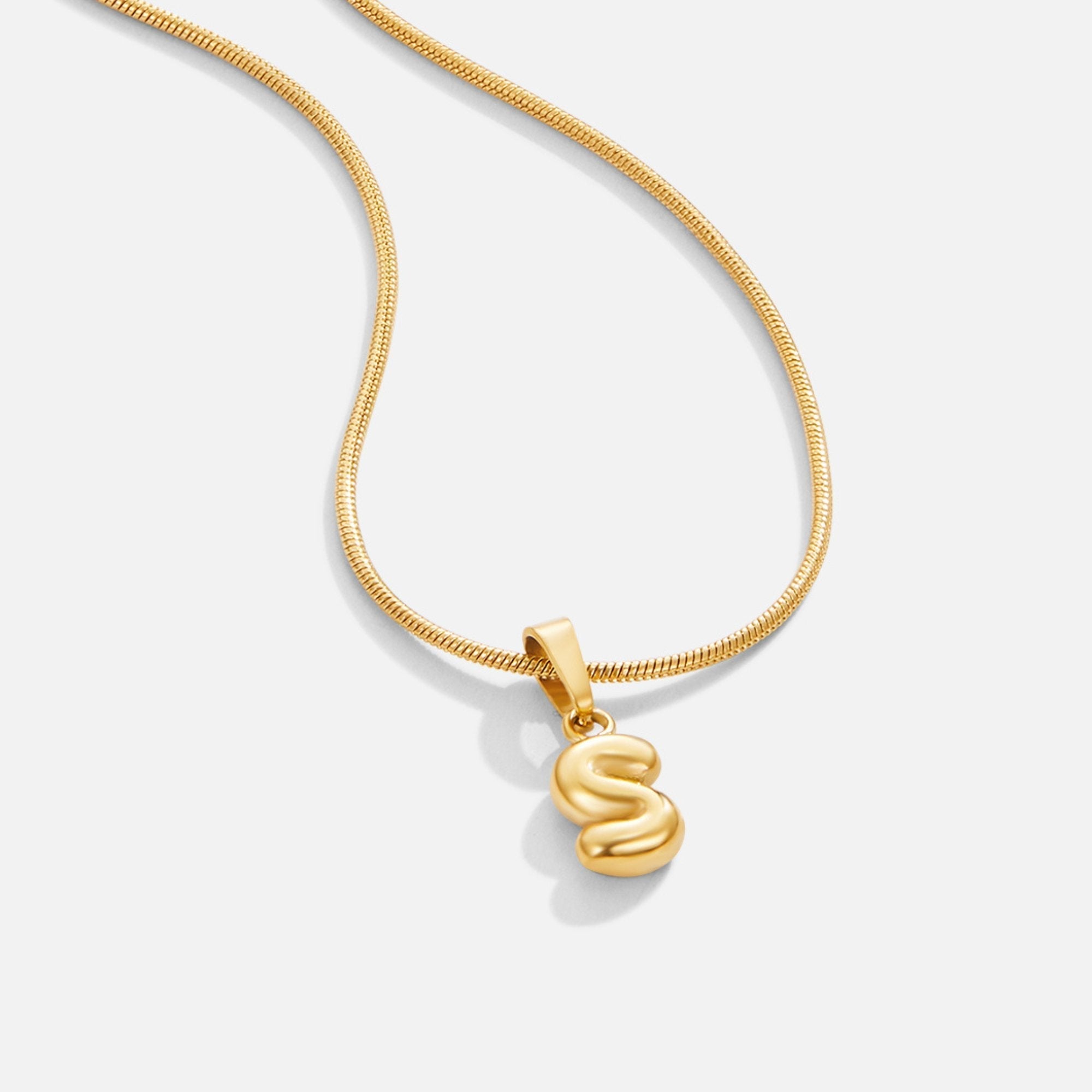 Esme - Bubble Letter Necklace Gold — crafted for everyday quality. Esme - Bubble Letter Necklace Gold — crafted for everyday quality.