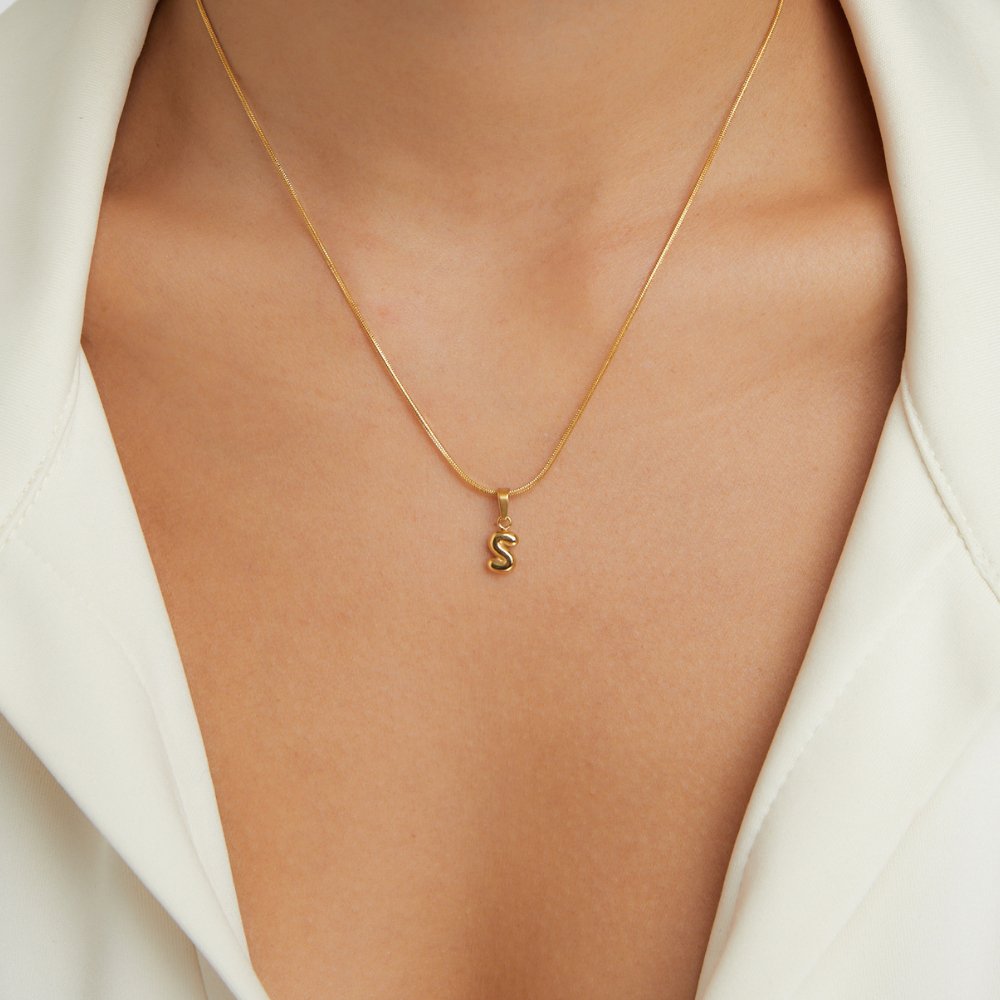 Esme - Bubble Letter Necklace Gold — crafted for everyday quality. Esme - Bubble Letter Necklace Gold — crafted for everyday quality.