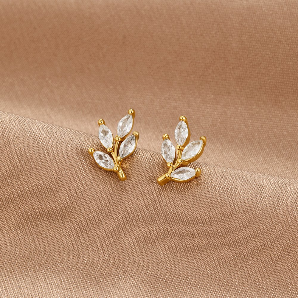 Viola - Crystal Leaf Stud Earrings — bringing modern charm to your space. Viola - Crystal Leaf Stud Earrings — bringing modern charm to your space.
