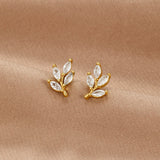 Viola - Crystal Leaf Stud Earrings — bringing modern charm to your space. Viola - Crystal Leaf Stud Earrings — bringing modern charm to your space.
