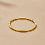 Aisha - Slim Gold Bangle — crafted for everyday quality. Aisha - Slim Gold Bangle — crafted for everyday quality.