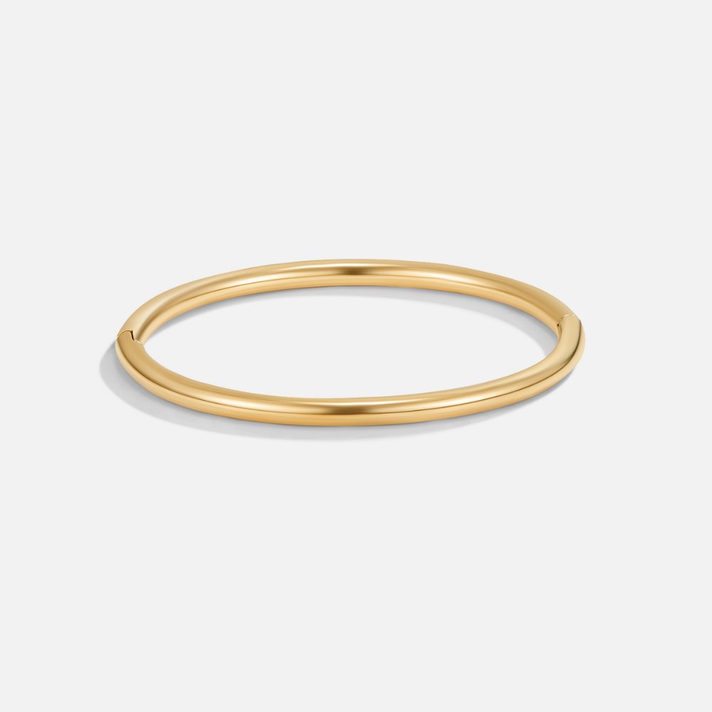 Aisha - Slim Gold Bangle — crafted for everyday quality. Aisha - Slim Gold Bangle — crafted for everyday quality.