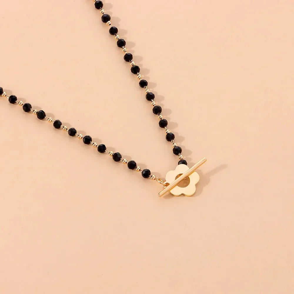 Elora - Flower Clasp Choker Necklace Black — crafted for everyday quality. Elora - Flower Clasp Choker Necklace Black — crafted for everyday quality.
