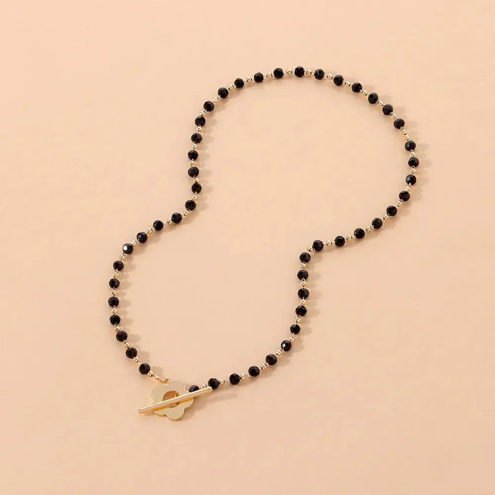 Elora - Flower Clasp Choker Necklace Black — crafted for everyday quality. Elora - Flower Clasp Choker Necklace Black — crafted for everyday quality.