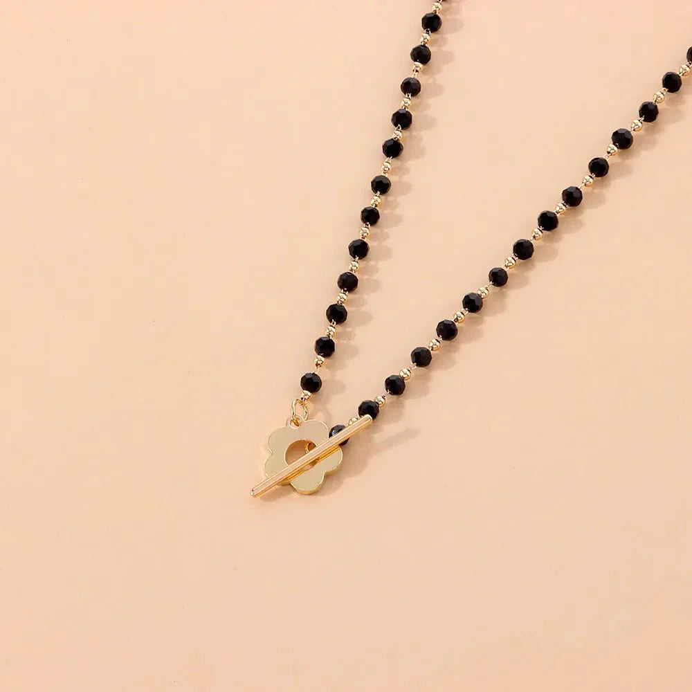 Elora - Flower Clasp Choker Necklace Black — crafted for everyday quality. Elora - Flower Clasp Choker Necklace Black — crafted for everyday quality.