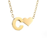 Niamh - Love & Letter Initial Necklace — bringing modern charm to your space. Niamh - Love & Letter Initial Necklace — bringing modern charm to your space.