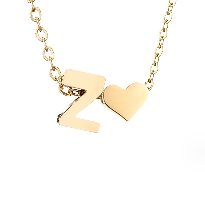 Niamh - Love & Letter Initial Necklace — bringing modern charm to your space. Niamh - Love & Letter Initial Necklace — bringing modern charm to your space.