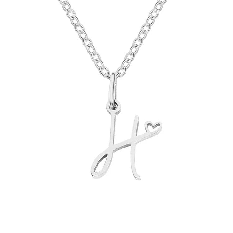 Skyla - Letter Heart Necklace — made with care and attention to detail. Skyla - Letter Heart Necklace — made with care and attention to detail.