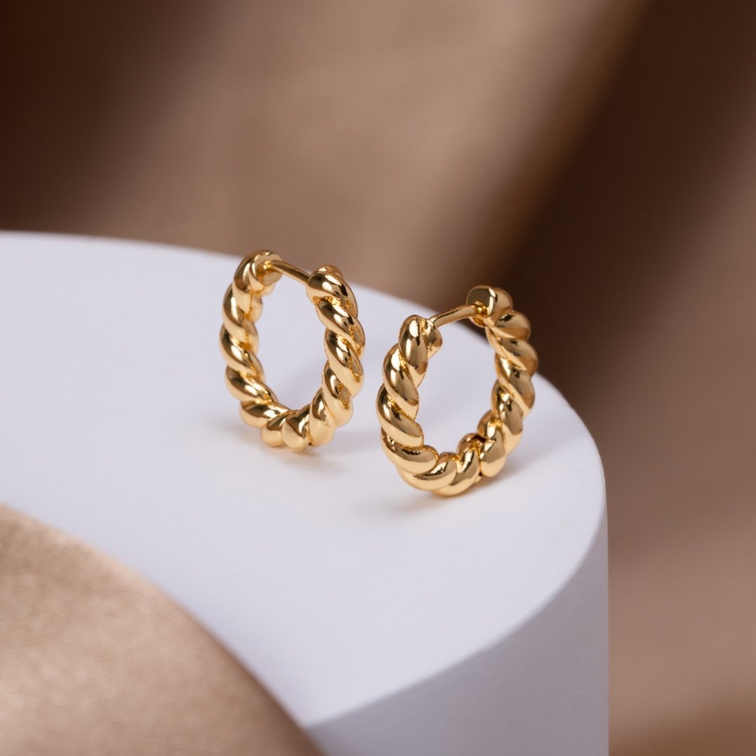 Madeline - Gold Twist Earrings — designed to inspire your lifestyle. Madeline - Gold Twist Earrings — designed to inspire your lifestyle.