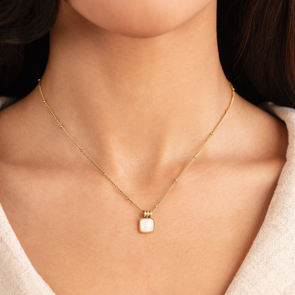 Cora - White Shell Pendant Necklace — crafted for everyday quality. Cora - White Shell Pendant Necklace — crafted for everyday quality.