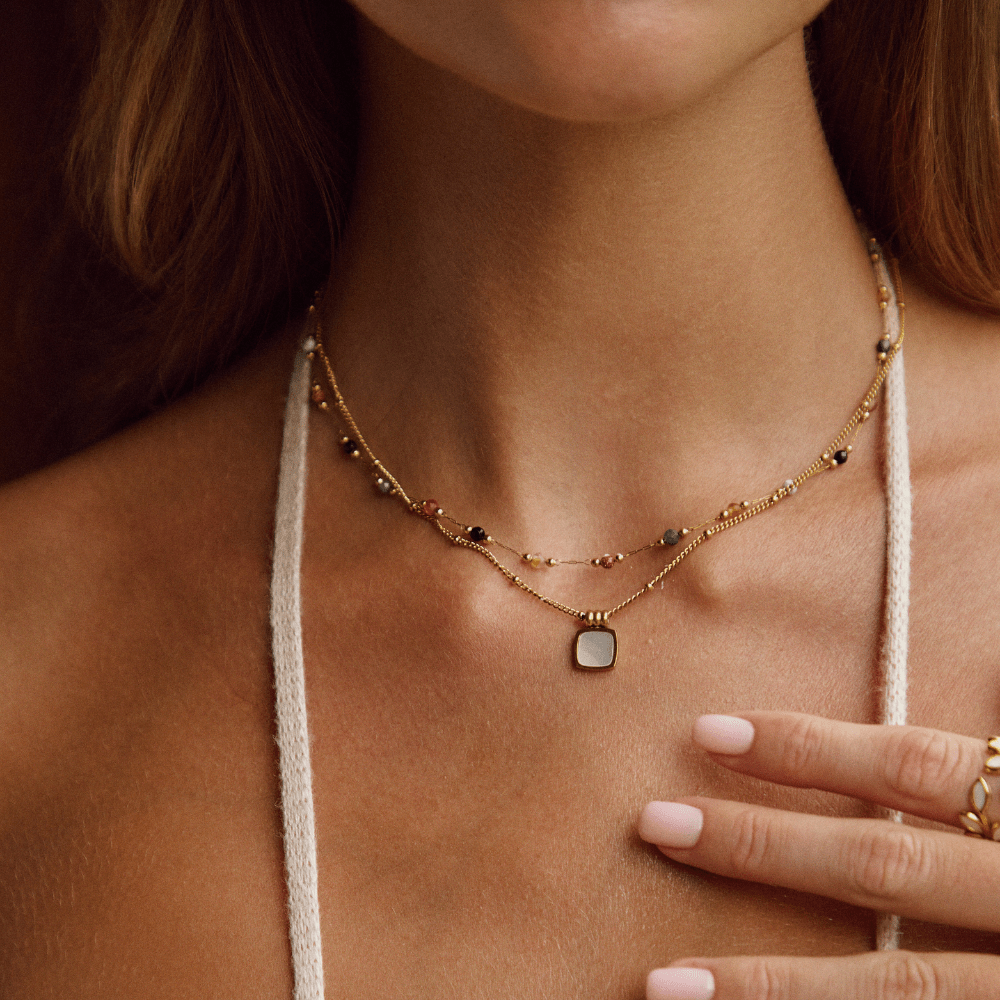 Cora - White Shell Pendant Necklace — crafted for everyday quality. Cora - White Shell Pendant Necklace — crafted for everyday quality.