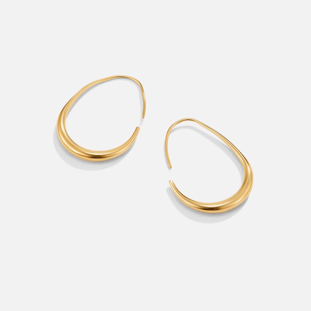 Nica - Gold Hoop Earrings — made with care and attention to detail. Nica - Gold Hoop Earrings — made with care and attention to detail.