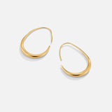Nica - Gold Hoop Earrings — made with care and attention to detail. Nica - Gold Hoop Earrings — made with care and attention to detail.