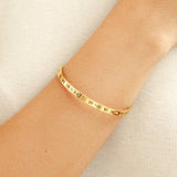 Sierra - Roman Gold Bangle — made with care and attention to detail. Sierra - Roman Gold Bangle — made with care and attention to detail.