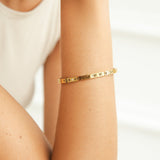 Sierra - Roman Gold Bangle — made with care and attention to detail. Sierra - Roman Gold Bangle — made with care and attention to detail.