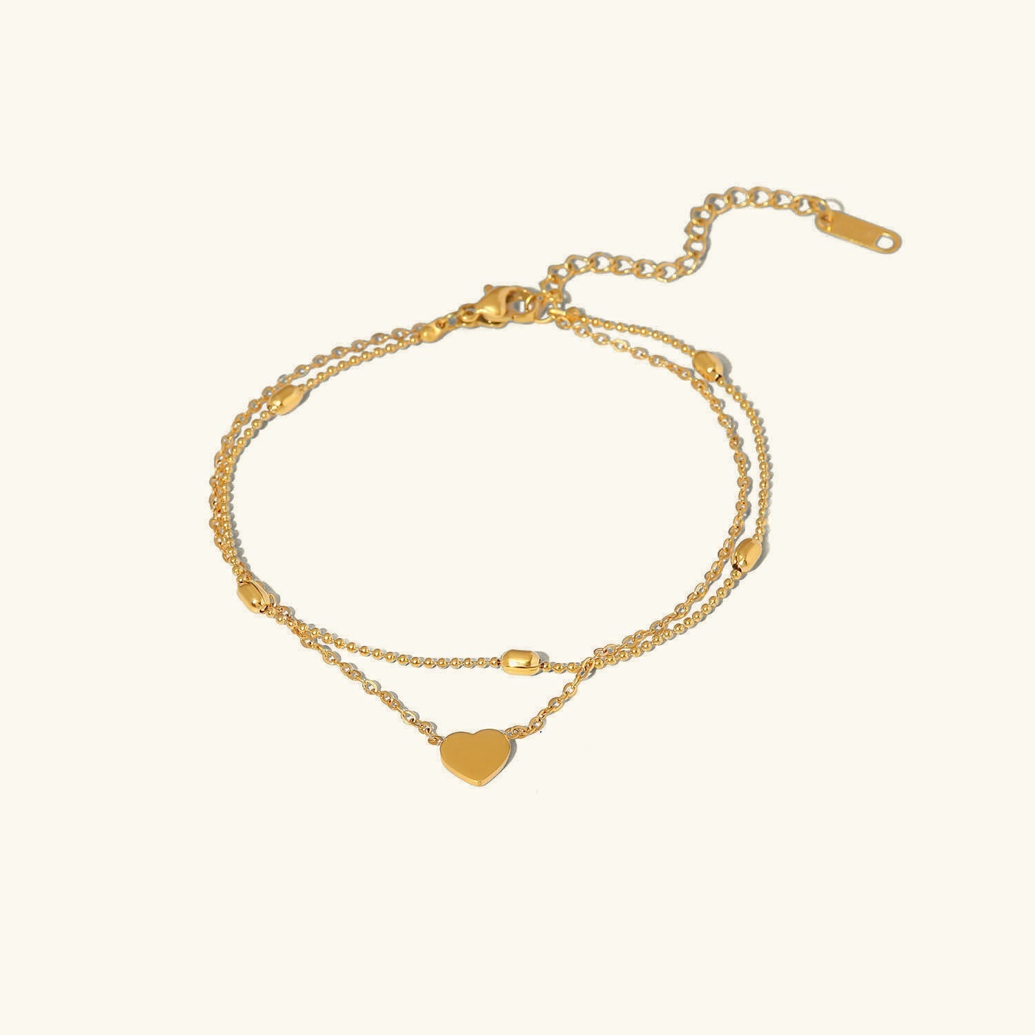 Hazel - Gold Heart Anklet — bringing modern charm to your space. Hazel - Gold Heart Anklet — bringing modern charm to your space.