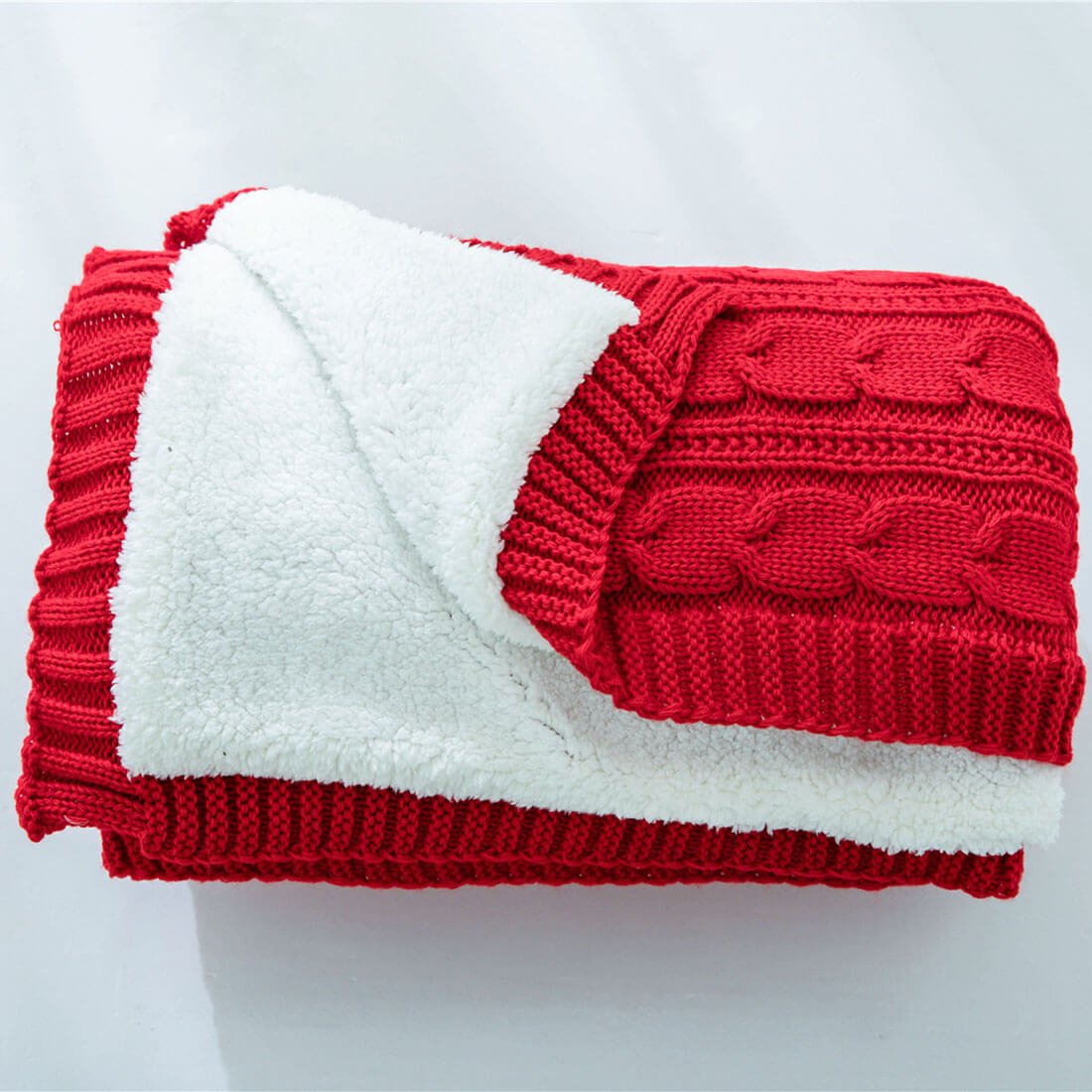 Couverture en laine sherpa à grosse maille douce pour une décoration intérieure confortable