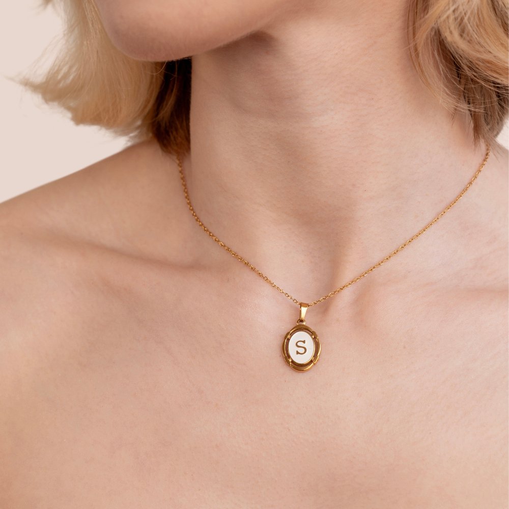 Trinity - Vintage Gold Letter Necklace — made with care and attention to detail. Trinity - Vintage Gold Letter Necklace — made with care and attention to detail.