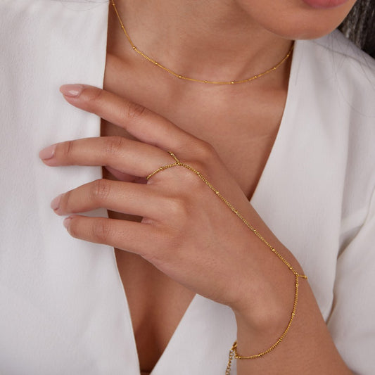 Kaya - 18K Gold Hand Chain Bracelet — made with care and attention to detail.