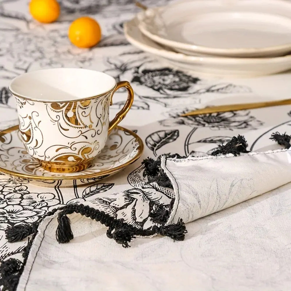 Schwarze florale Quasten-Bauernhaus-Tischdecke