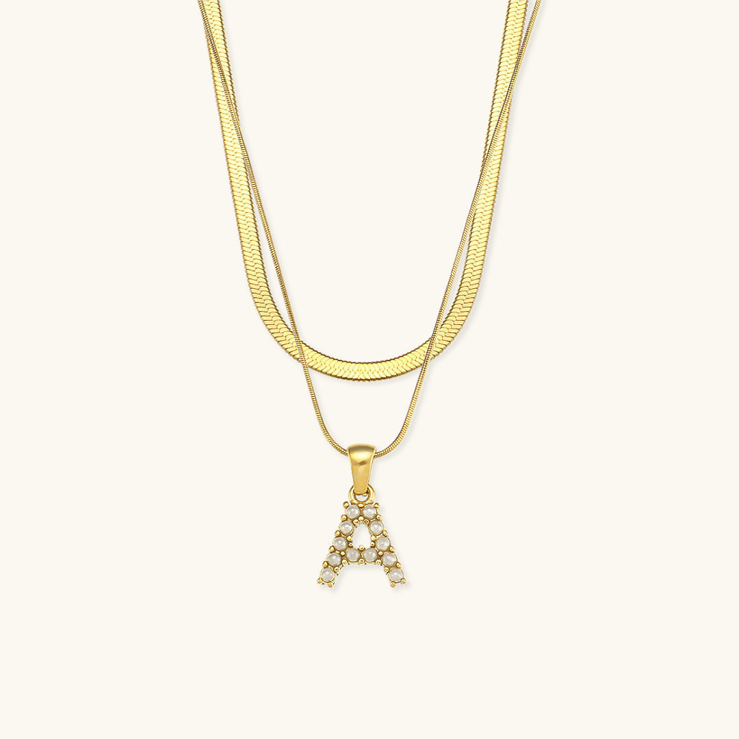 Marissa - Layered Gold Initial Letter Necklace — bringing modern charm to your space.