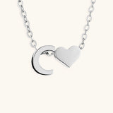 Mallory - Love Initial Letter Necklace — bringing modern charm to your space.