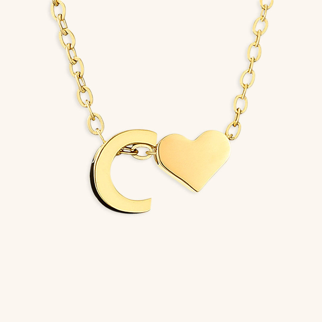 Mallory - Love Initial Letter Necklace — bringing modern charm to your space.