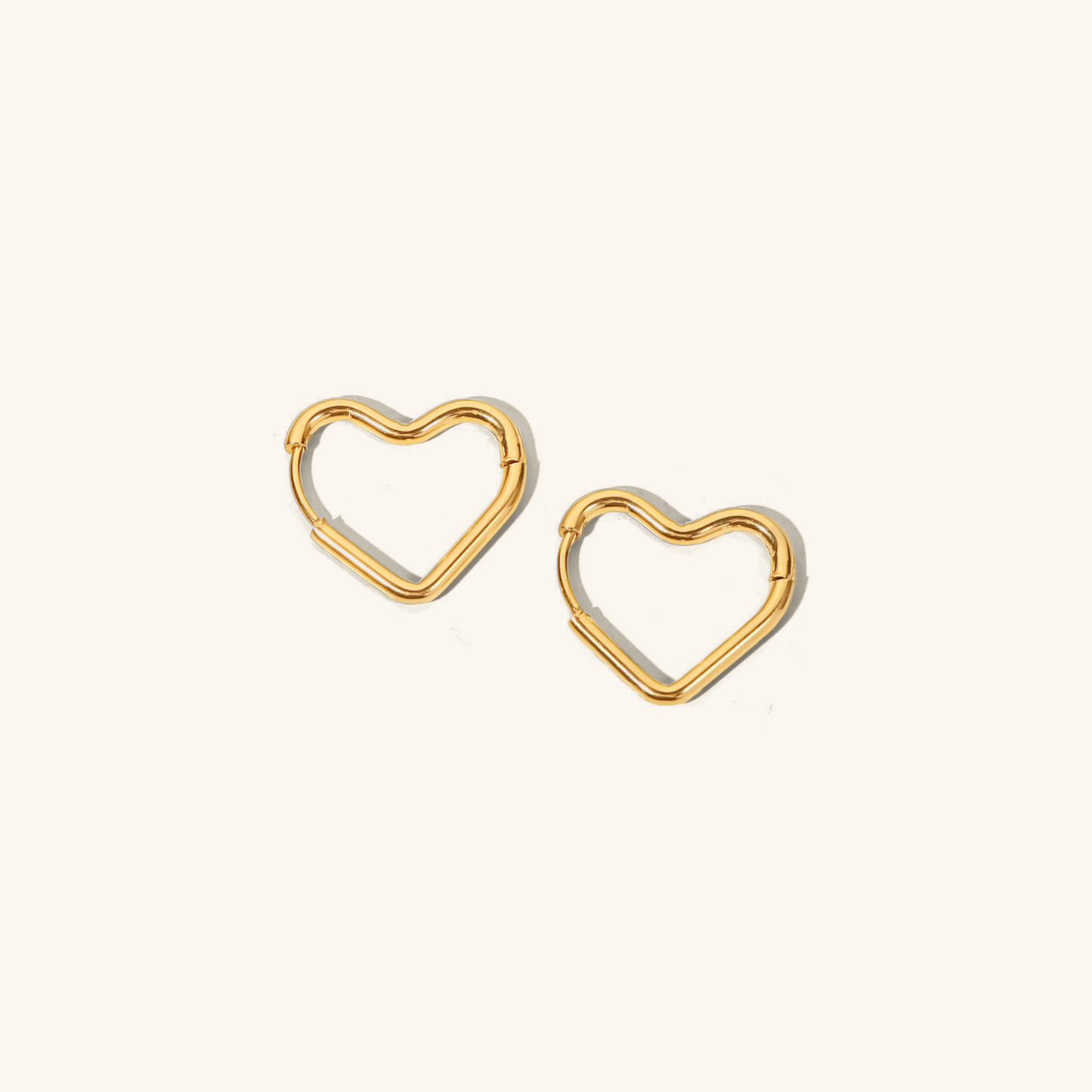 Clarissa - Heart Hoop Earrings — bringing modern charm to your space.