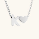 Mallory - Love Initial Letter Necklace — bringing modern charm to your space.