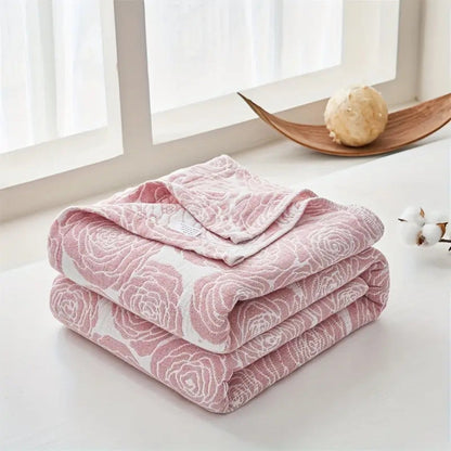 Plaid en coton rose doux pour une décoration intérieure chaleureuse et confortable