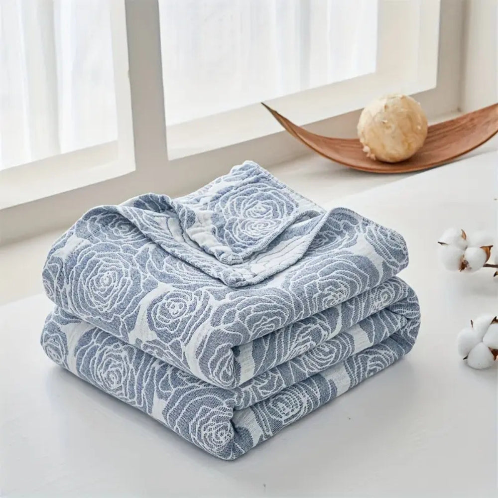 Plaid en coton rose doux pour une décoration intérieure chaleureuse et confortable