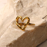 Nalini - Hollow Heart Ring — bringing modern charm to your space.