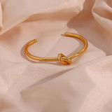 Leah - Knot Gold Bangle — designed to inspire your lifestyle.