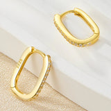 Sandra - Oval Hoop Earrings — made with care and attention to detail.