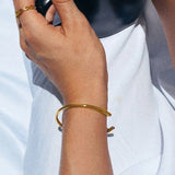 Alicia - Gold Bangle — bringing modern charm to your space.