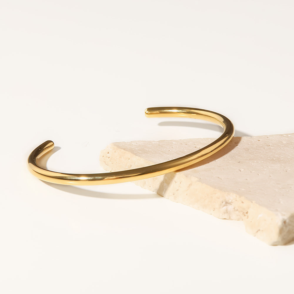 Alicia - Gold Bangle — bringing modern charm to your space.