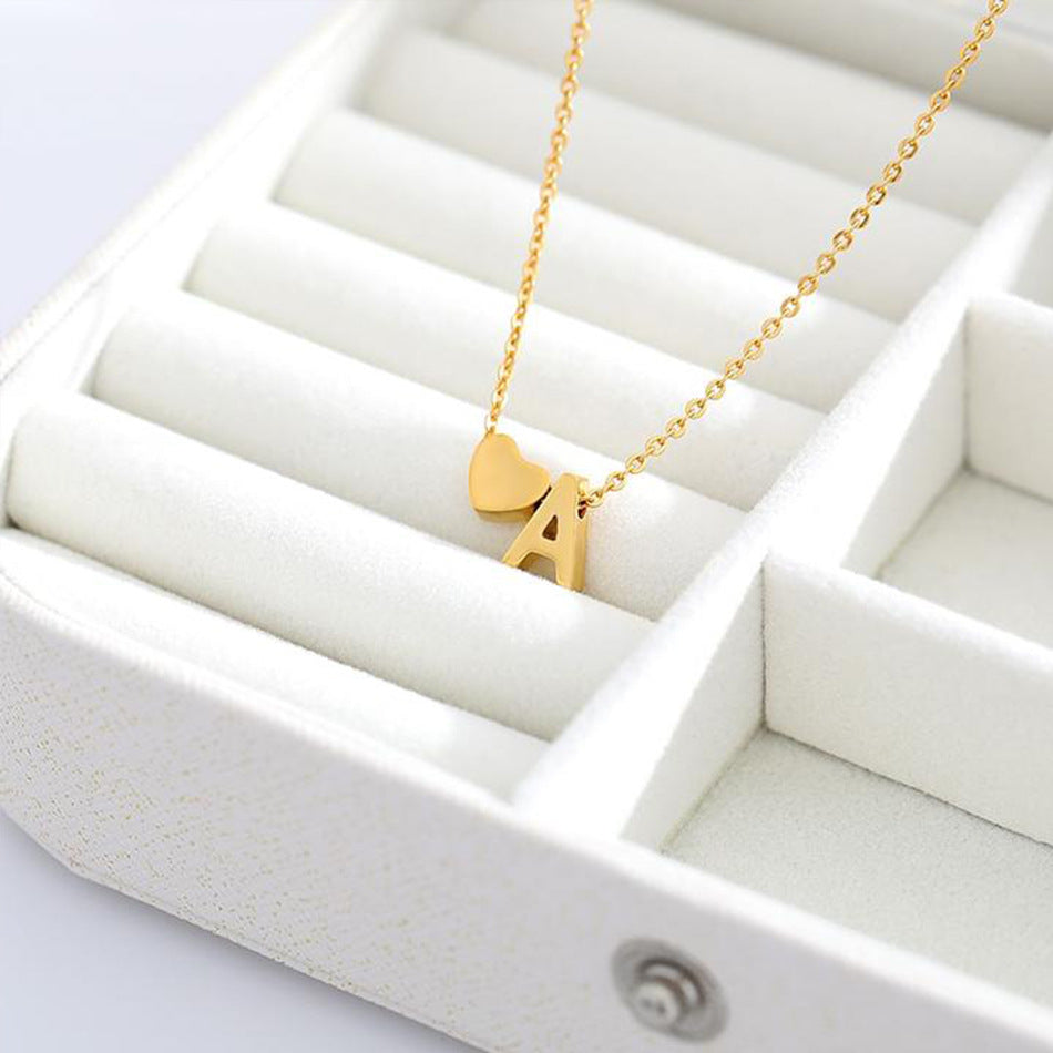 Mallory - Love Initial Letter Necklace — bringing modern charm to your space.