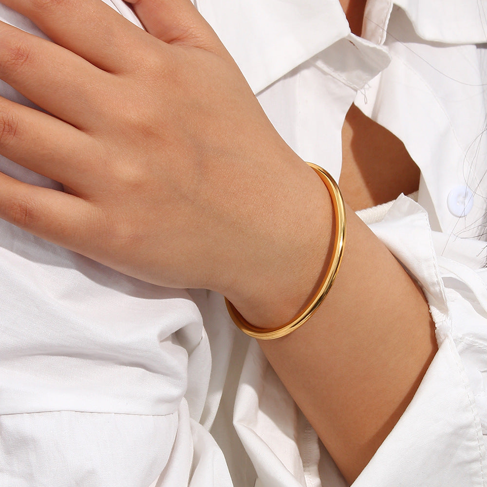 Alicia - Gold Bangle — bringing modern charm to your space.